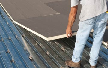 benefits of insulating Mountain Cross flat roofing
