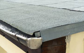 repair or replace Mountain Cross flat roofing?